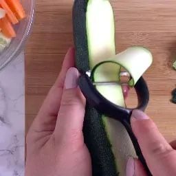 Making zucchini stripes with a peeler