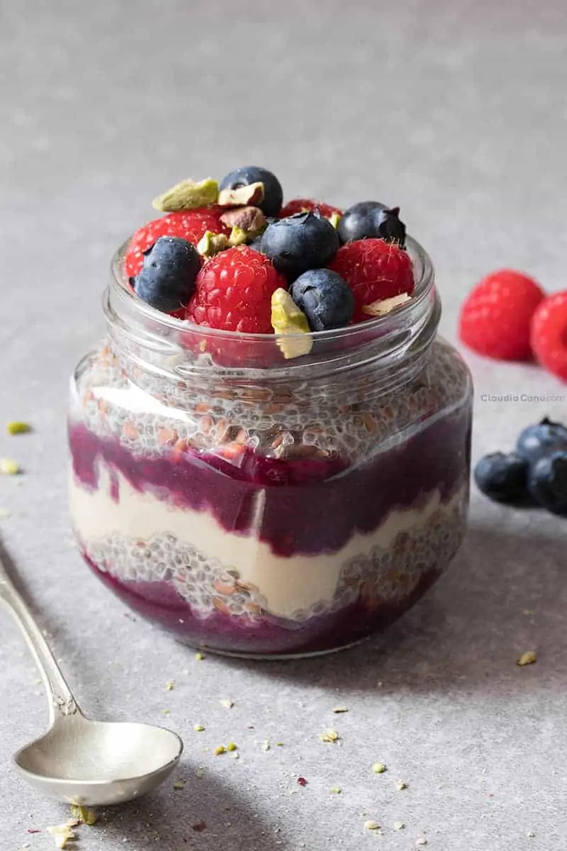 Chia and flaxseed pudding with jam and almond butter