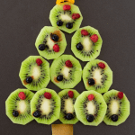 A tree made with kiwis and berries used as decoration