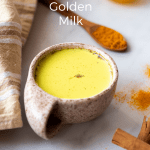 A mug with a yellow liquid called golden milk