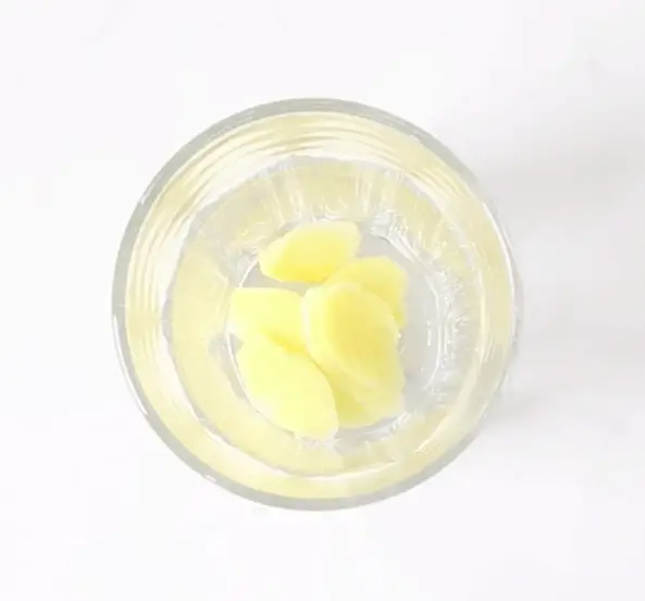 A glass with ginger slices